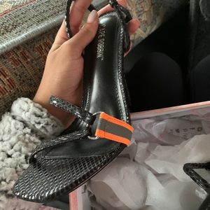 Black/orange reflective heels